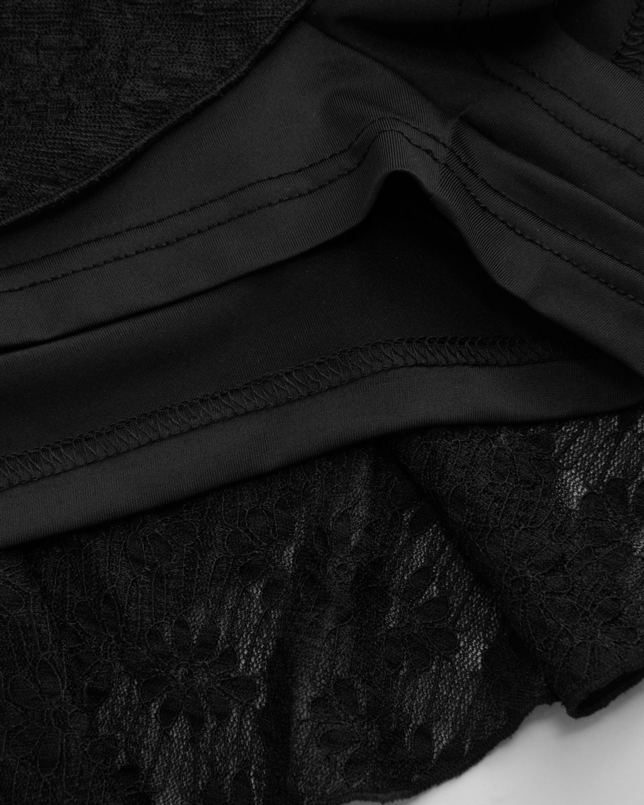 Black Lace Halter-Neck Mini Dress with Knotted Waist, Metal Accent, and Asymmetrical Hem