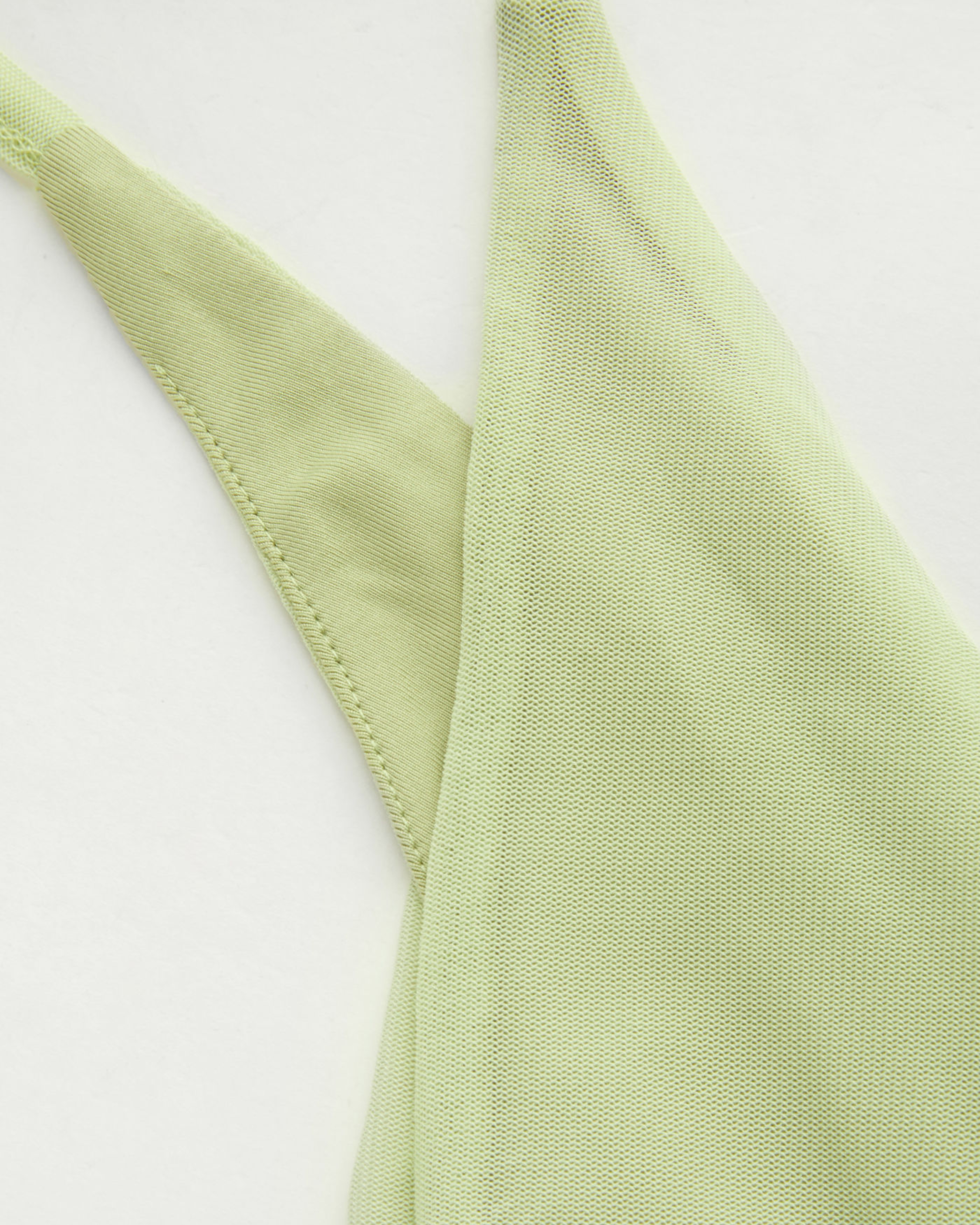 Women’s Solid Mesh Asymmetrical Neck Mini Dress with Layered Ruffle Hem.